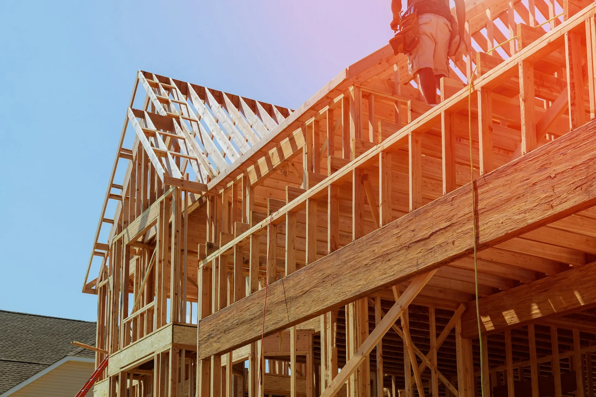 Framing contractor working on a wood structure